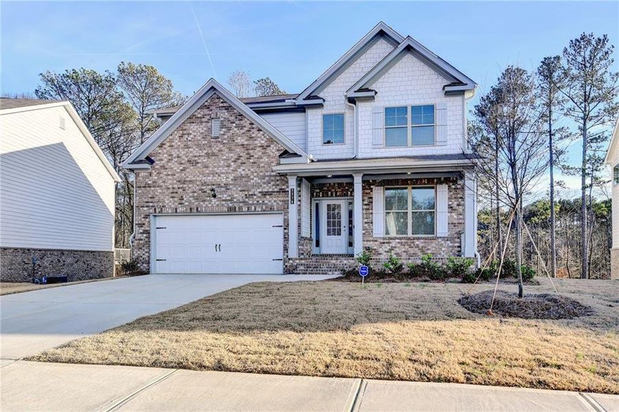 Front exterior of a new home in , Lawrenceville, GA, highlighting curb appeal (Image 2). Front exterior of a new home in , Lawrenceville, GA, highlighting curb appeal (Image 2).