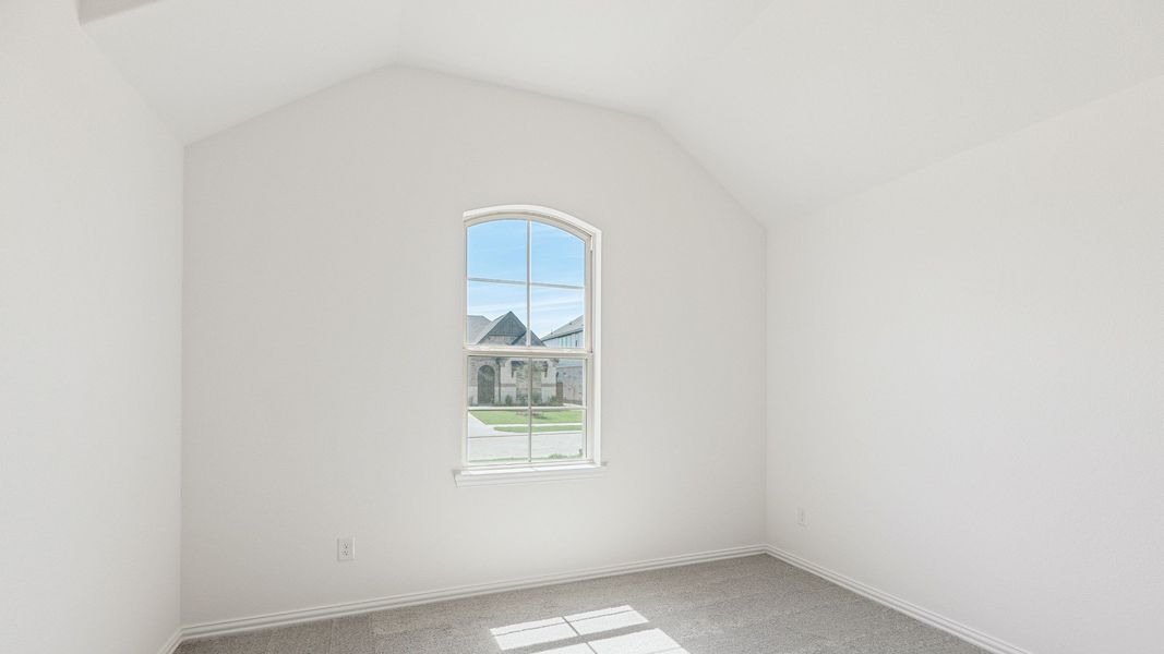 Furnished interior view inside a new home in Sunterra, Katy (Image 11).