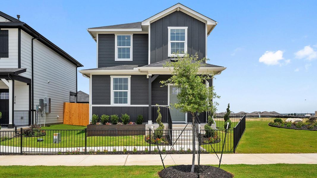 Front exterior of a new home in Valverde, Bastrop, TX, highlighting curb appeal (Image 25).