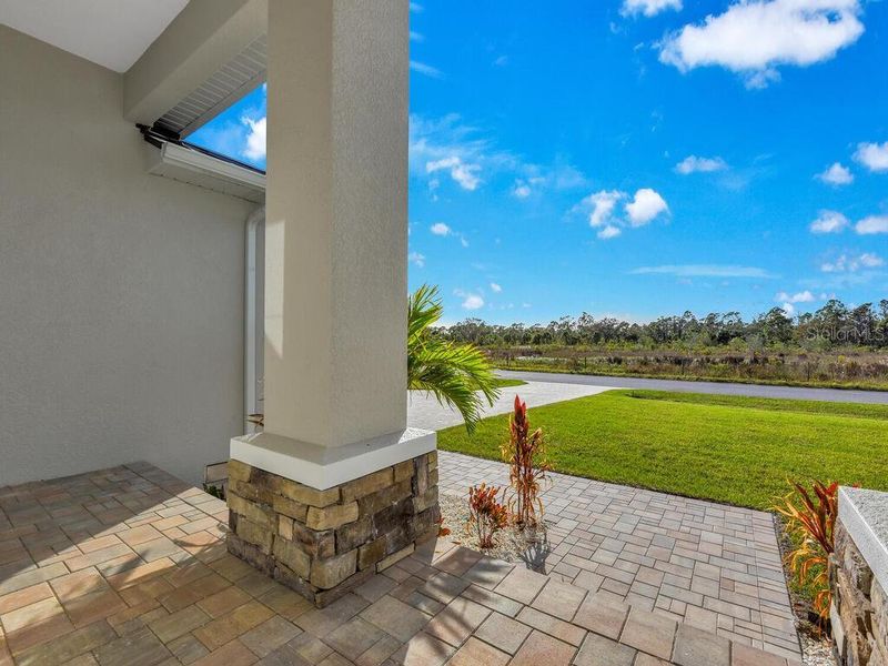 Exterior details and patio area of a home in , Rotonda West (Image 20).
