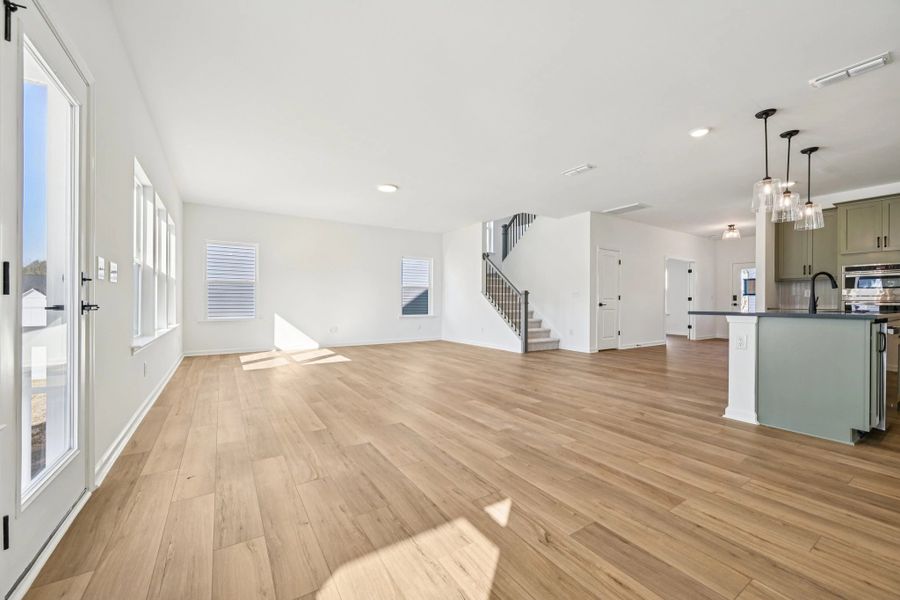 Family Room featuring the AW Collection® Rosemary - Earth-toned comfort made for connection.