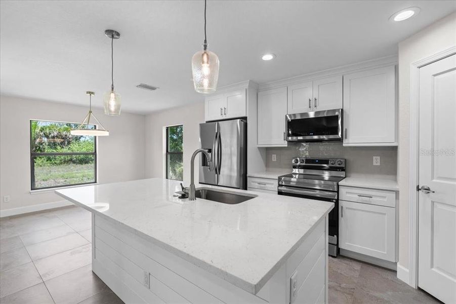Furnished interior view inside a new home in , Englewood (Image 11). Furnished interior view inside a new home in , Englewood (Image 11).