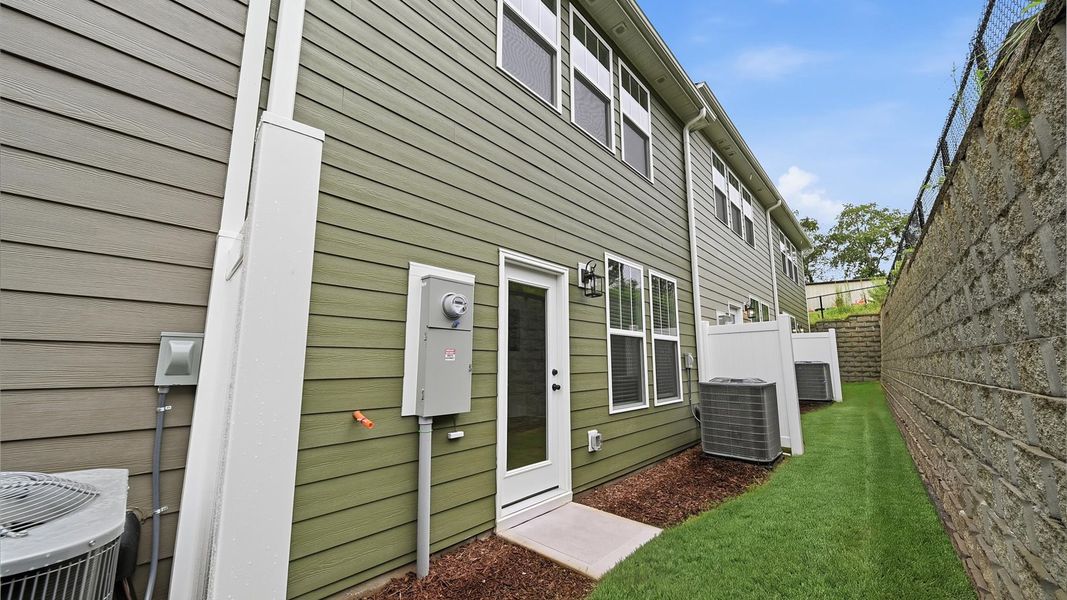 Exterior details and patio area of a home in Clayton Crossing, Arden (Image 3).