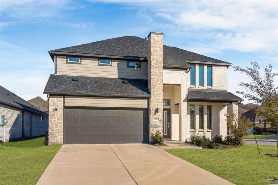 Front exterior of a new home in Wolf Creek Farms, Melissa, TX, highlighting curb appeal (Image 26).
