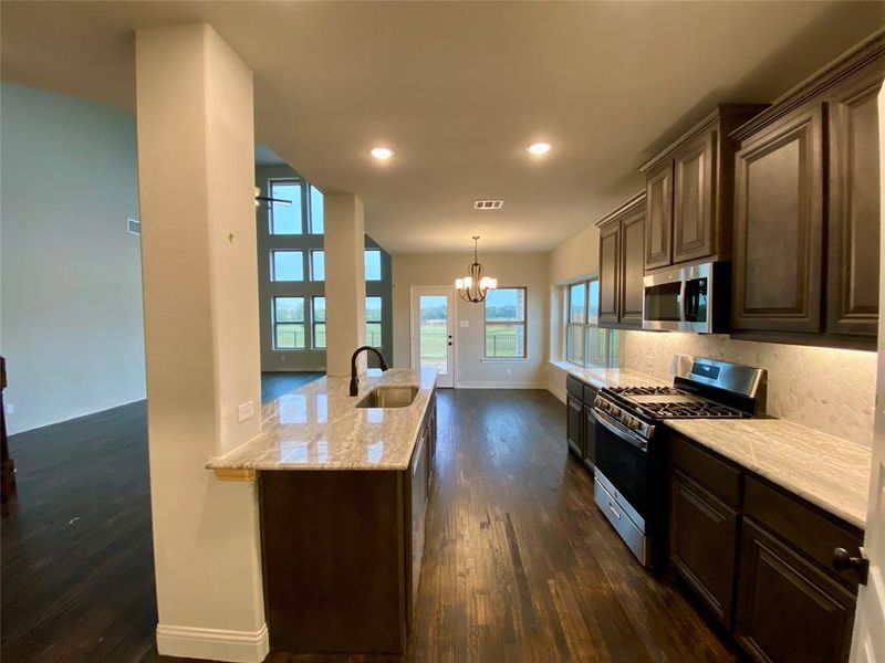 Listed home has White Quartz w/grey veins