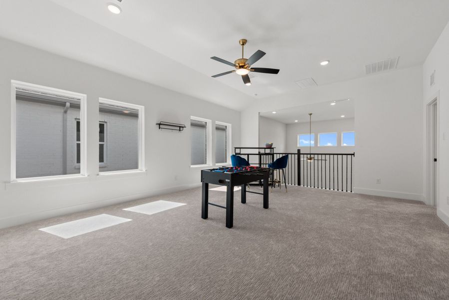 Representative furnished interior of a home built from the Plan 2 by Monarch Homes in Royal Court, Frisco (Image 27).