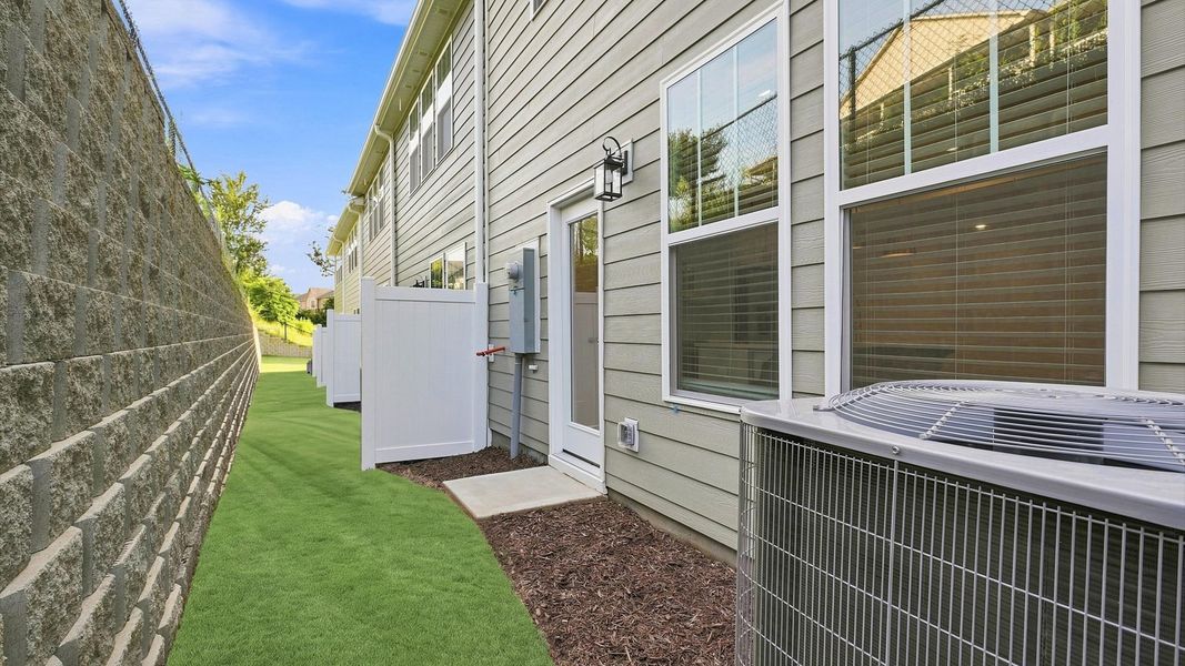Highly desirable rear exterior with refined craftsmanship in a reputable neighborhood at Clayton Crossing