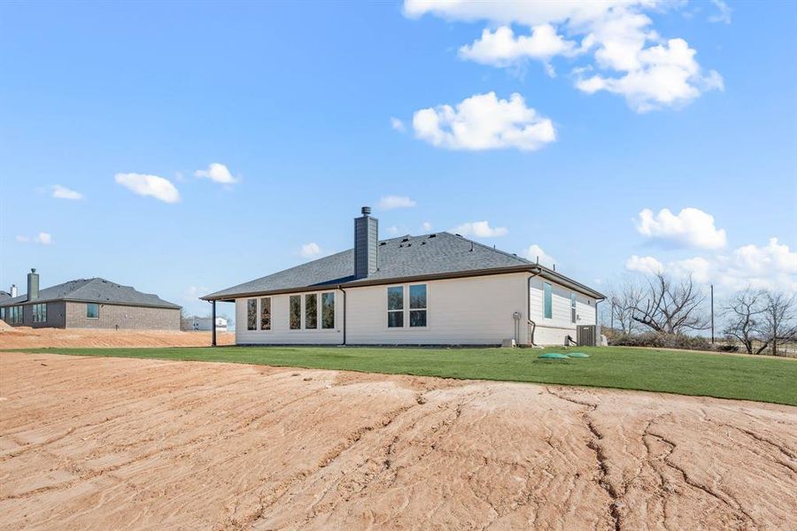 Exterior details and patio area of a home in Saddleback Estates, Boyd (Image 24). Exterior details and patio area of a home in Saddleback Estates, Boyd (Image 24).