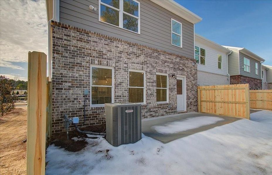 Exterior details and patio area of a home in Wildwood Place, Powder Springs (Image 3).