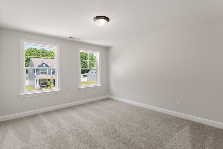 Spacious, unfurnished interior of a new home in Fiddler's Ridge, Advance (Image 27).