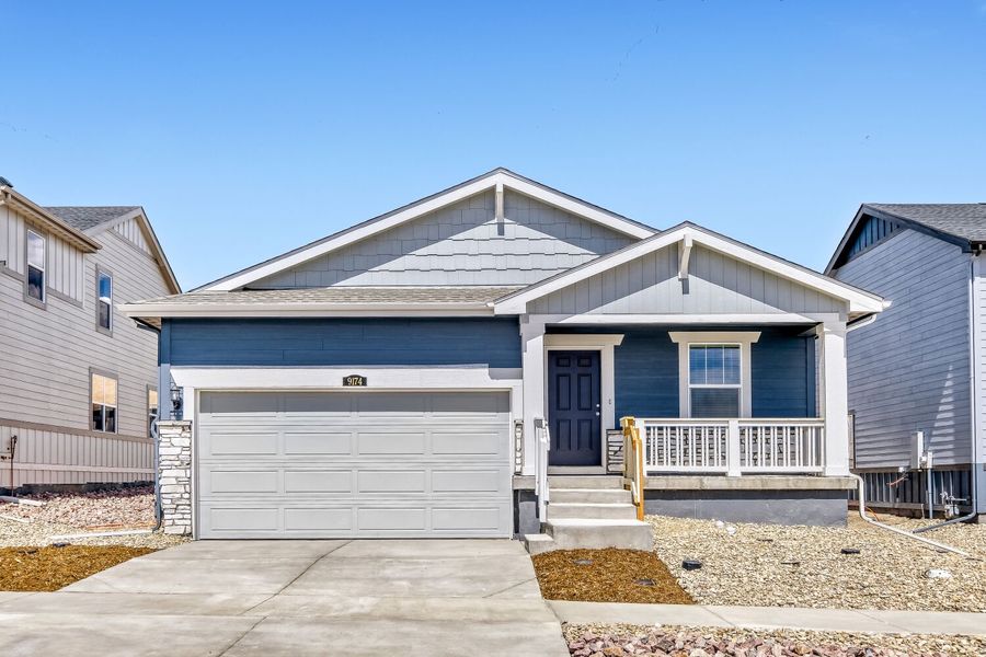 Front exterior of a new home in Percheron, Colorado Springs, CO, highlighting curb appeal (Image 1). Front exterior of a new home in Percheron, Colorado Springs, CO, highlighting curb appeal (Image 1).
