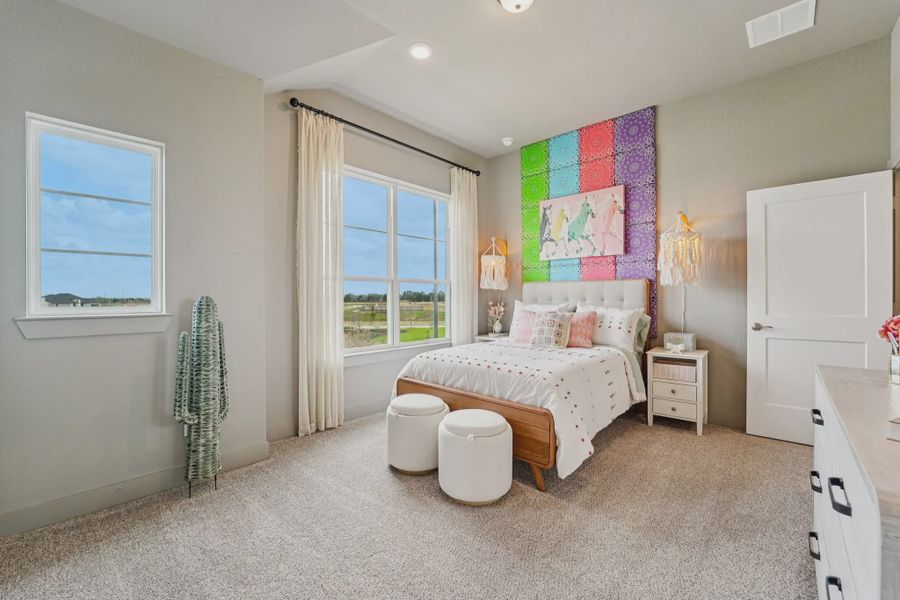 Furnished interior view inside a new home in Sunterra, Katy (Image 9).