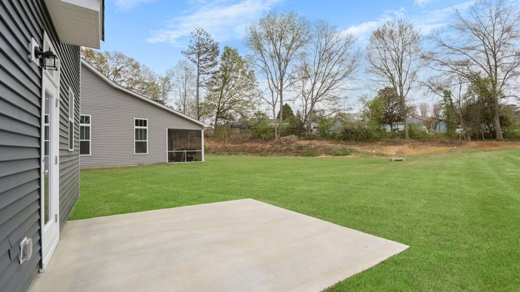 Representative exterior details of a home built from the Phoenix by D.R. Horton in River Trace, Simpsonville (Image 23).