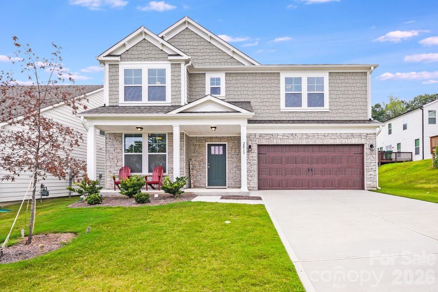 Front exterior of a new home in , Charlotte, NC, highlighting curb appeal (Image 19).