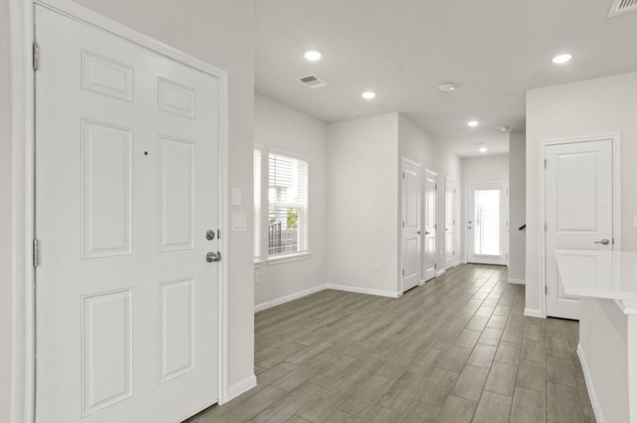 Spacious, unfurnished interior of a new home in Whisper Valley, Manor (Image 11).