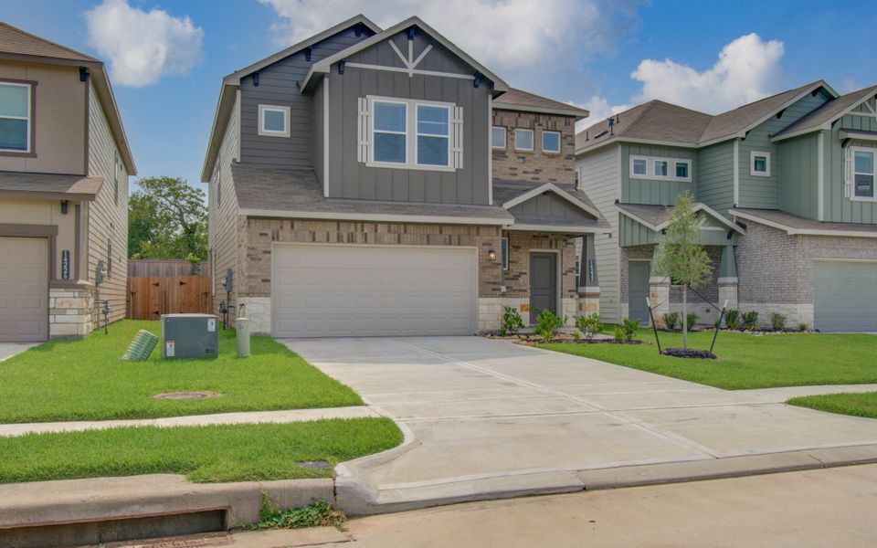 Front exterior of a new home in Aldine Pines, Houston, TX, highlighting curb appeal (Image 25).