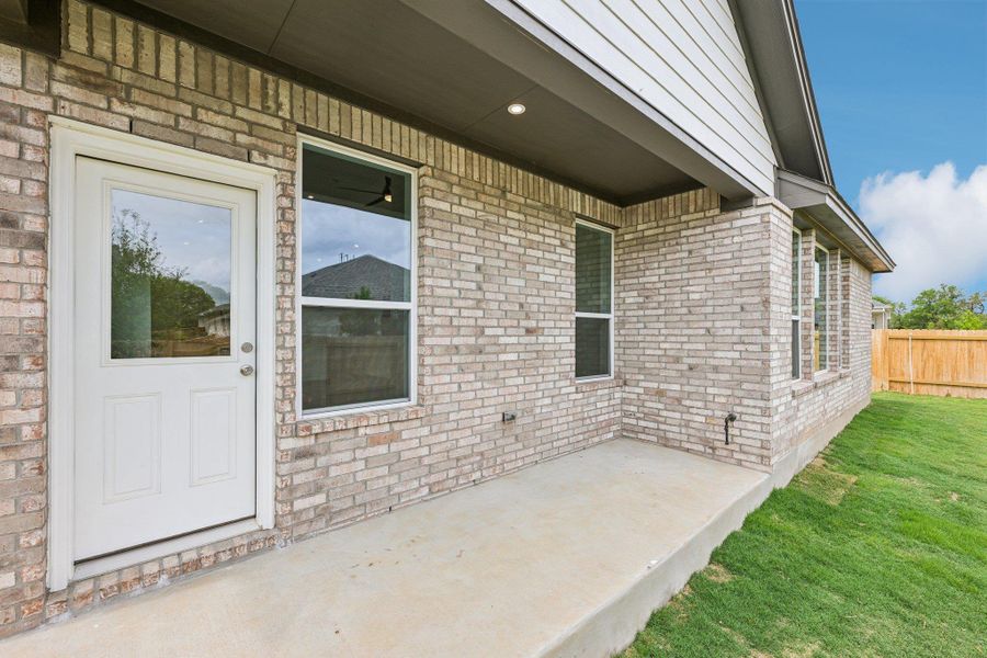 Exterior details and patio area of a home in Persimmon, Buda (Image 3).