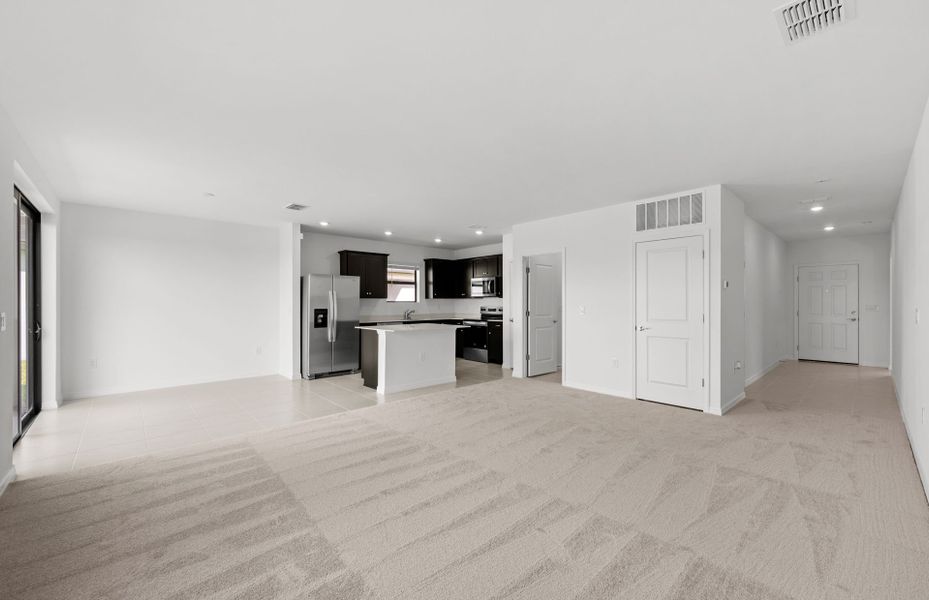 Spacious, unfurnished interior of a new home in Whispering Lakes, Lehigh Acres (Image 22).