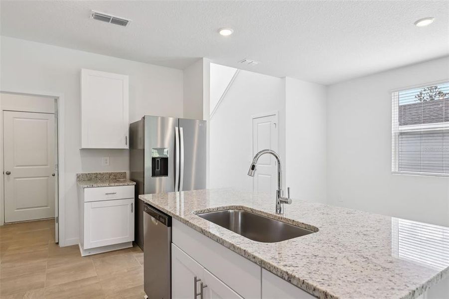 Furnished interior view inside a new home in Flagler Village - Classic Series, Palm Coast (Image 14). Furnished interior view inside a new home in Flagler Village - Classic Series, Palm Coast (Image 14).