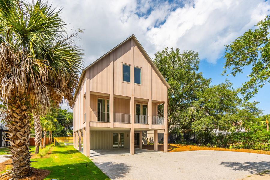 Front exterior of a new home in , Edisto Island, SC, highlighting curb appeal (Image 2). Front exterior of a new home in , Edisto Island, SC, highlighting curb appeal (Image 2).
