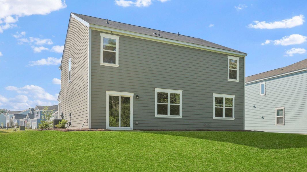 Front exterior of a new home in Lakeview at Kitfield, Moncks Corner, SC, highlighting curb appeal (Image 17). Front exterior of a new home in Lakeview at Kitfield, Moncks Corner, SC, highlighting curb appeal (Image 17).