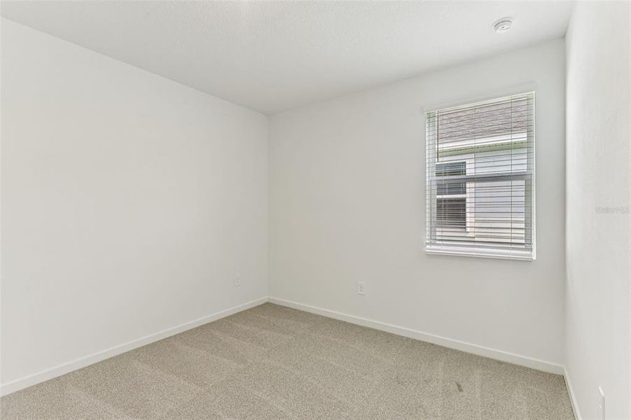 Spacious, unfurnished interior of a new home in Colbert Landings, Palm Coast (Image 27).