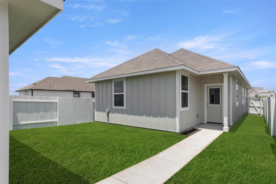 Front exterior of a new home in Casetta Ranch, Kyle, TX, highlighting curb appeal (Image 14). Front exterior of a new home in Casetta Ranch, Kyle, TX, highlighting curb appeal (Image 14).