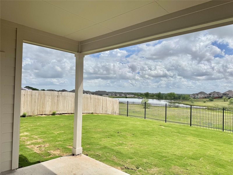 Exterior details and patio area of a home in Carillon, Manor (Image 3).