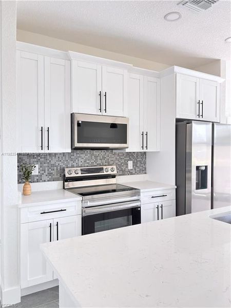 Furnished interior view inside a new home in , Lehigh Acres (Image 7).