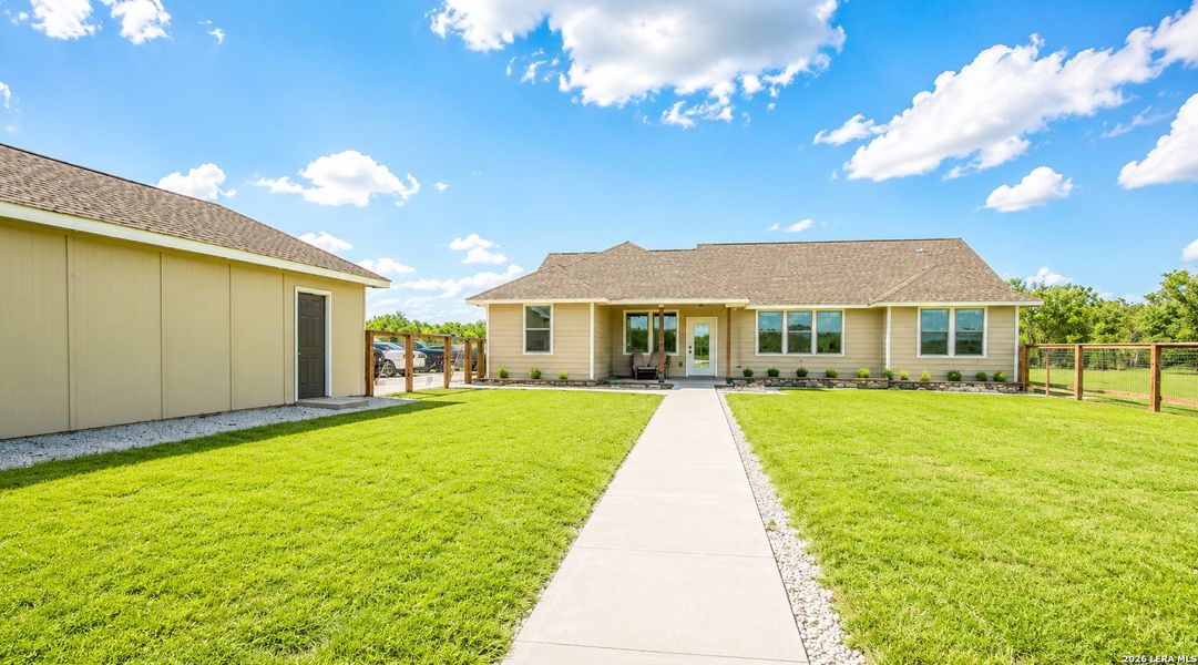Exterior details and patio area of a home in , Devine (Image 20).