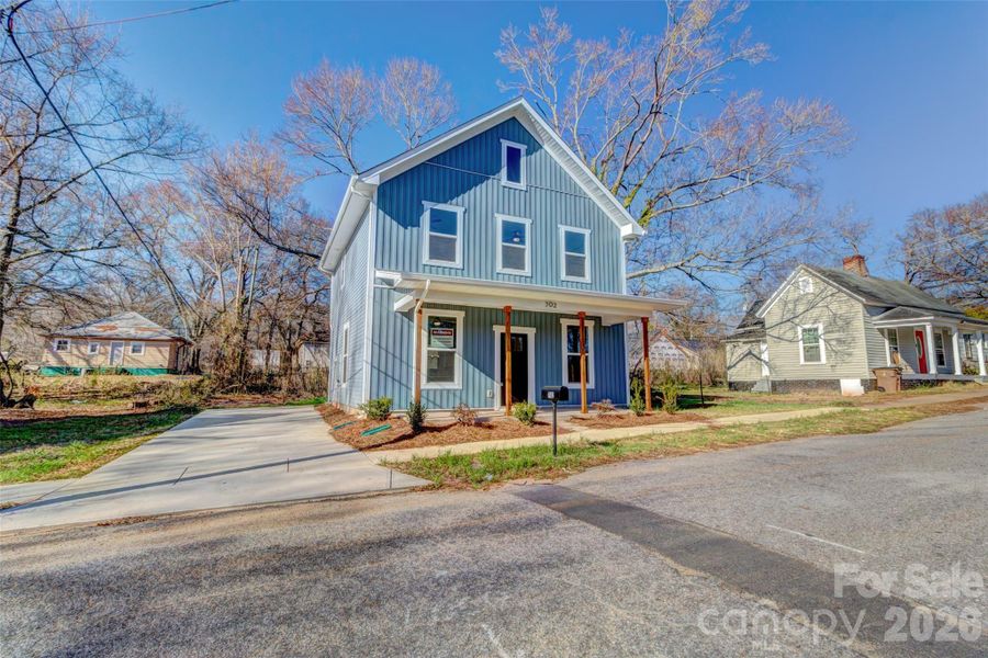 Front exterior of a new home in , Shelby, NC, highlighting curb appeal (Image 18). Front exterior of a new home in , Shelby, NC, highlighting curb appeal (Image 18).