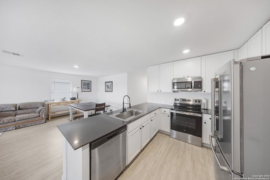 Furnished interior view inside a new home in Guadalupe Heights: Watermill Collection, Seguin (Image 11). Furnished interior view inside a new home in Guadalupe Heights: Watermill Collection, Seguin (Image 11).