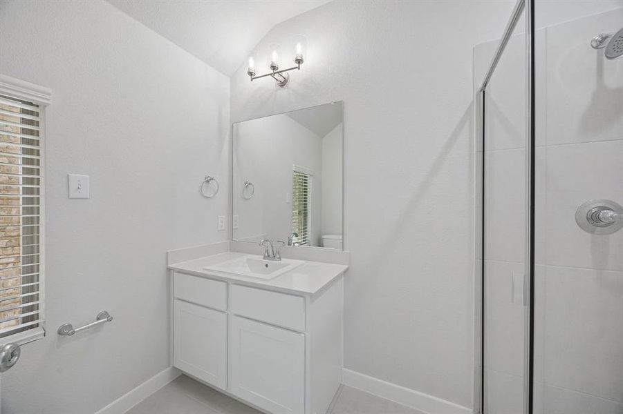 Bathroom in the Masters home plan by Trophy Signature Homes – REPRESENTATIVE PHOTO Bathroom in the Masters home plan by Trophy Signature Homes – REPRESENTATIVE PHOTO