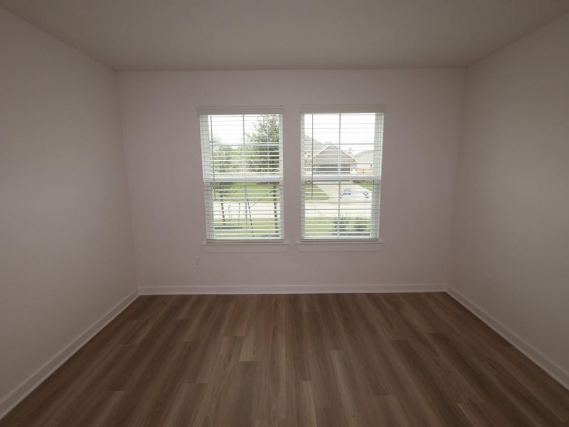 Spacious, unfurnished interior of a new home in Pinewood at Grand Texas, New Caney (Image 12).