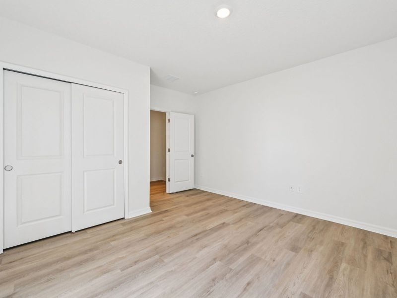 Spacious, unfurnished interior of a new home in Oakfield Trails - Premier Series, Parrish (Image 9).