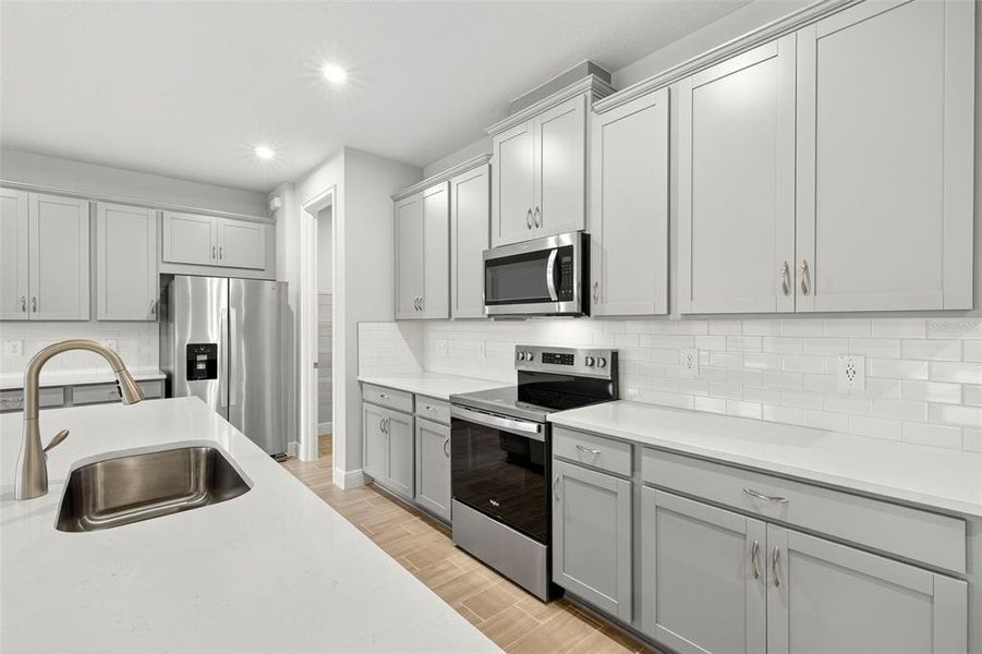 Furnished interior view inside a new home in Windwater, Parrish (Image 4).