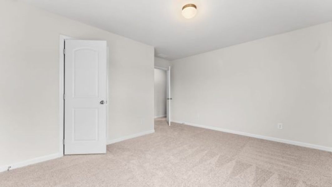 Representative unfurnished interior of a home built from the Bramblewood Townhome by Piedmont Residential in The Retreat at Browns Ridge, Newnan (Image 24).