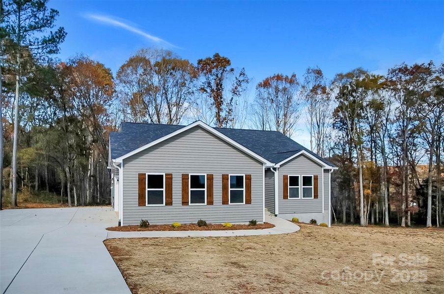 Front exterior of a new home in , Vale, NC, highlighting curb appeal (Image 2). Front exterior of a new home in , Vale, NC, highlighting curb appeal (Image 2).