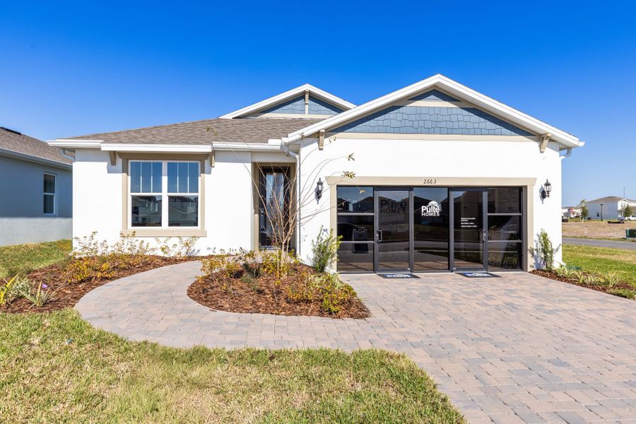 Representative exterior photo of a completed home built from the Highgate by Pulte Homes in Tohoqua, Kissimmee, FL (Image 22). Representative exterior photo of a completed home built from the Highgate by Pulte Homes in Tohoqua, Kissimmee, FL (Image 22).