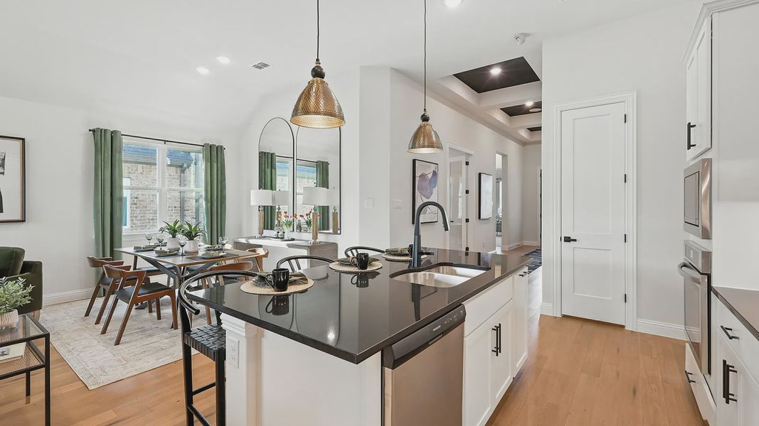 Model home photos of similar floorplans, not pictures of actual home.