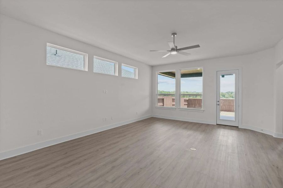 Representative unfurnished interior of a home built from the Maddie by Chesmar Homes in Stillwater Ranch, San Antonio (Image 4).
