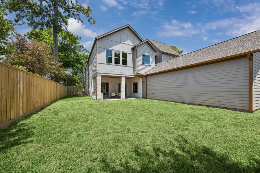 Exterior details and patio area of a home in , Houston (Image 2). Exterior details and patio area of a home in , Houston (Image 2).
