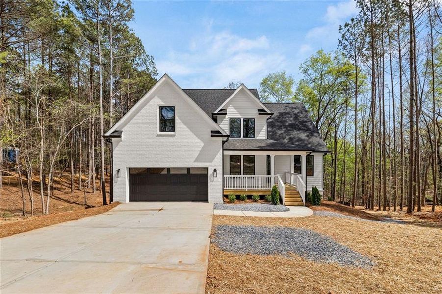 Front exterior of a new home in , Lula, GA, highlighting curb appeal (Image 18). Front exterior of a new home in , Lula, GA, highlighting curb appeal (Image 18).