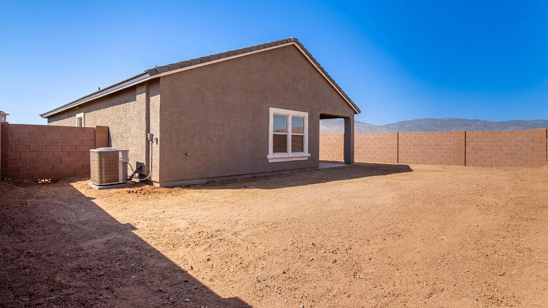 Representative exterior photo of a completed home built from the Baxter by D.R. Horton in The Oasis at Rocking K, Vail, AZ (Image 17).