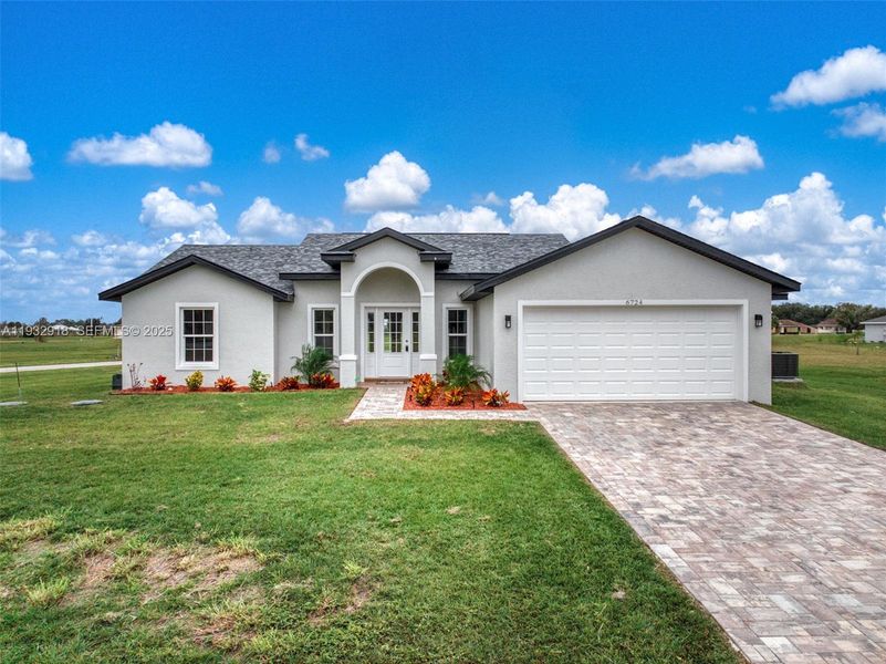 Front exterior of a new home in , Sebring, FL, highlighting curb appeal (Image 24).