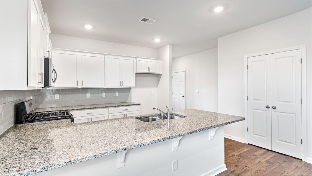 Representative furnished interior of a home built from the Davidson by D.R. Horton in Brookside Farms, Greer (Image 9).