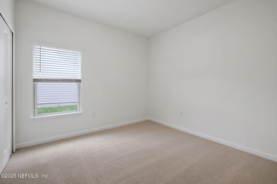 Spacious, unfurnished interior of a new home in Brook Forest, St. Augustine (Image 27).