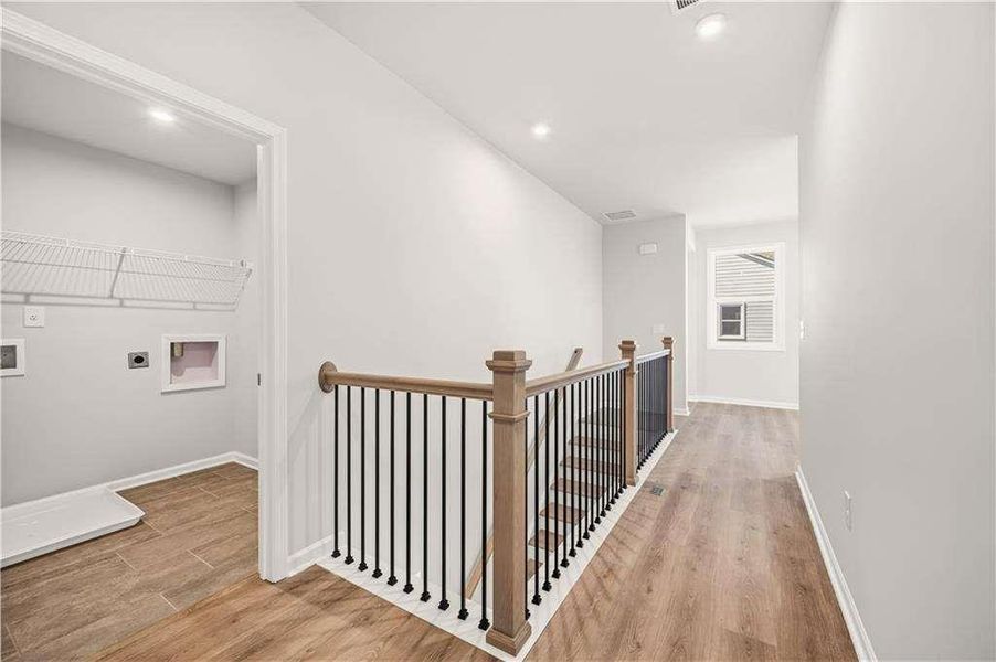 Spacious, unfurnished interior of a new home in The Paddocks at Doc Hughes, Buford (Image 27).