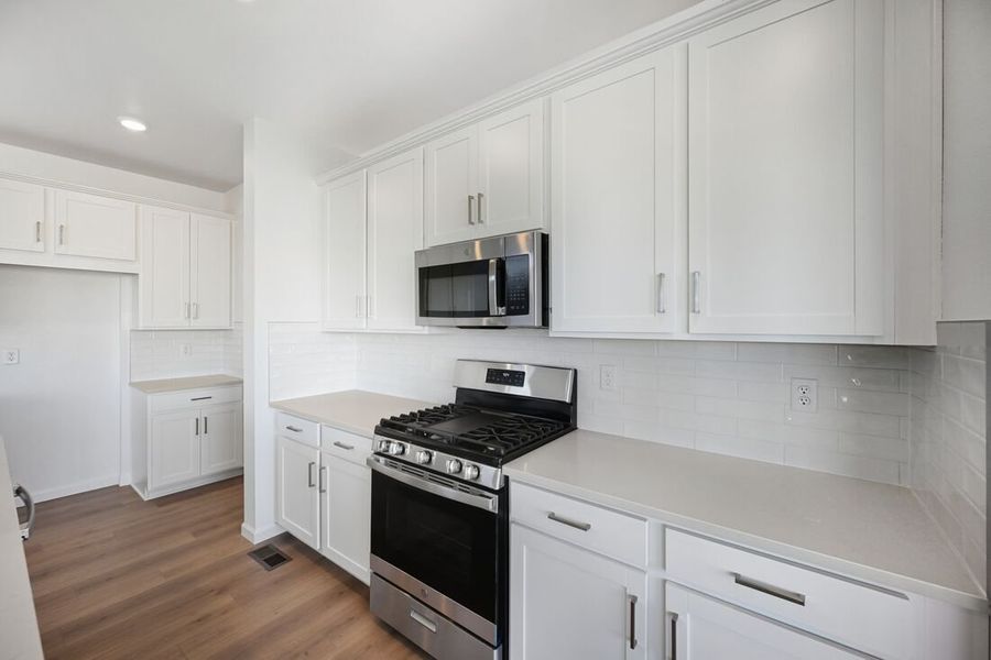 Furnished interior view inside a new home in Trailstone, Arvada (Image 5).