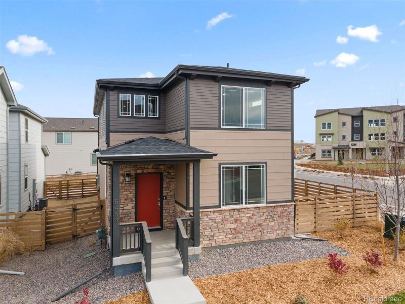 Exterior details and patio area of a home in , Aurora (Image 2).